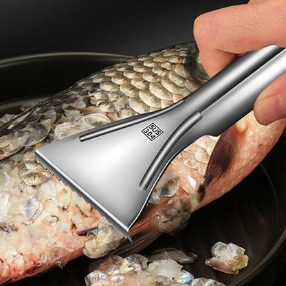 🐟Skarp Fiskskalare i Rostfritt Stål🔪Ergonomiskt Grepp för Effektiv Fjällning i Köket🧤