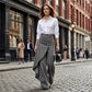Asymmetriska omlottjeans 👖 Kombinera culottes och byxor, hög midja för att förlänga benen, vida och böljande, med diagonalt placerade knappar – förvandla dig omedelbart till en fashionista! ✨