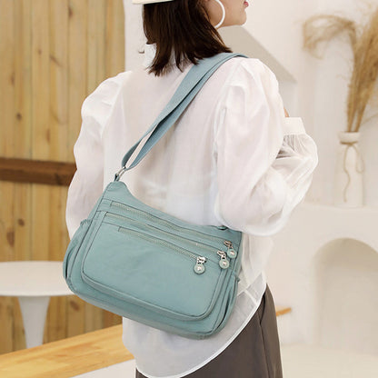 ✨50% RABATT NU! Lätt crossbody-väska i nylon – flera fickor, justerbar rem & vattentålig 🎒✨
