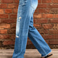 👖 🖤 Dams Distressade Slim Fit Utsvängda Jeans – Edgy & Benförlängande ✂️